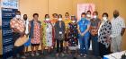 Participants in the 10 December, 2021 human rights forum in Kokopo city, Papua New Guinea, pose for a group photo. Photo: UN Women